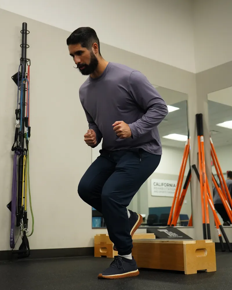Dr. Rodriguez jumping down from a plyometric box