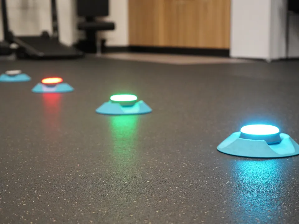 BlazePod reaction lights glowing on the gym floor